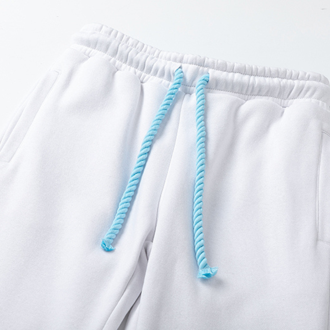 Chándal blanco y azul de Syna World