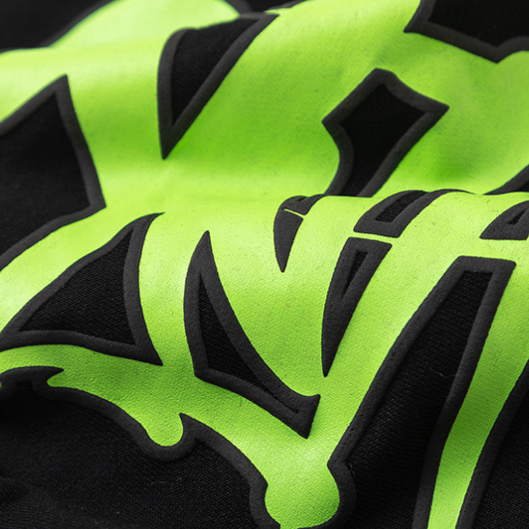 Chándal negro y verde de Syna World