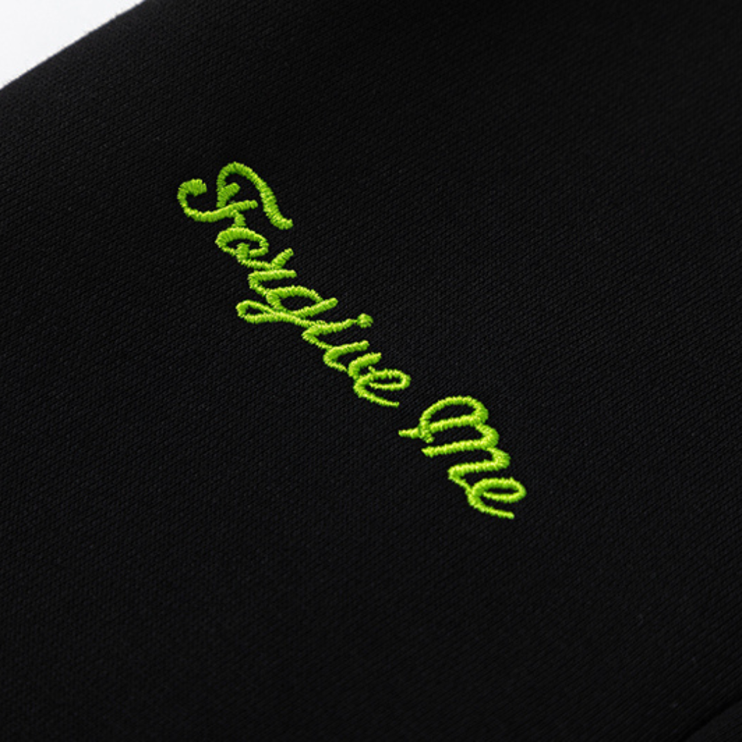 Chándal negro y verde de Syna World