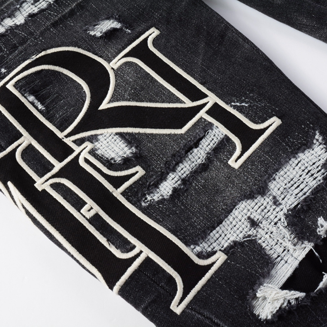 Amr Staggered Logo Patch Jeans
