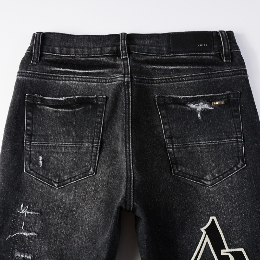 Amr Staggered Logo Patch Jeans