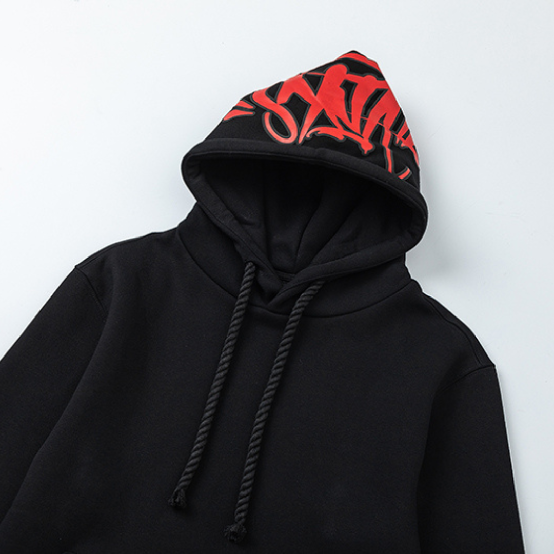 Chándal negro y rojo de Syna World