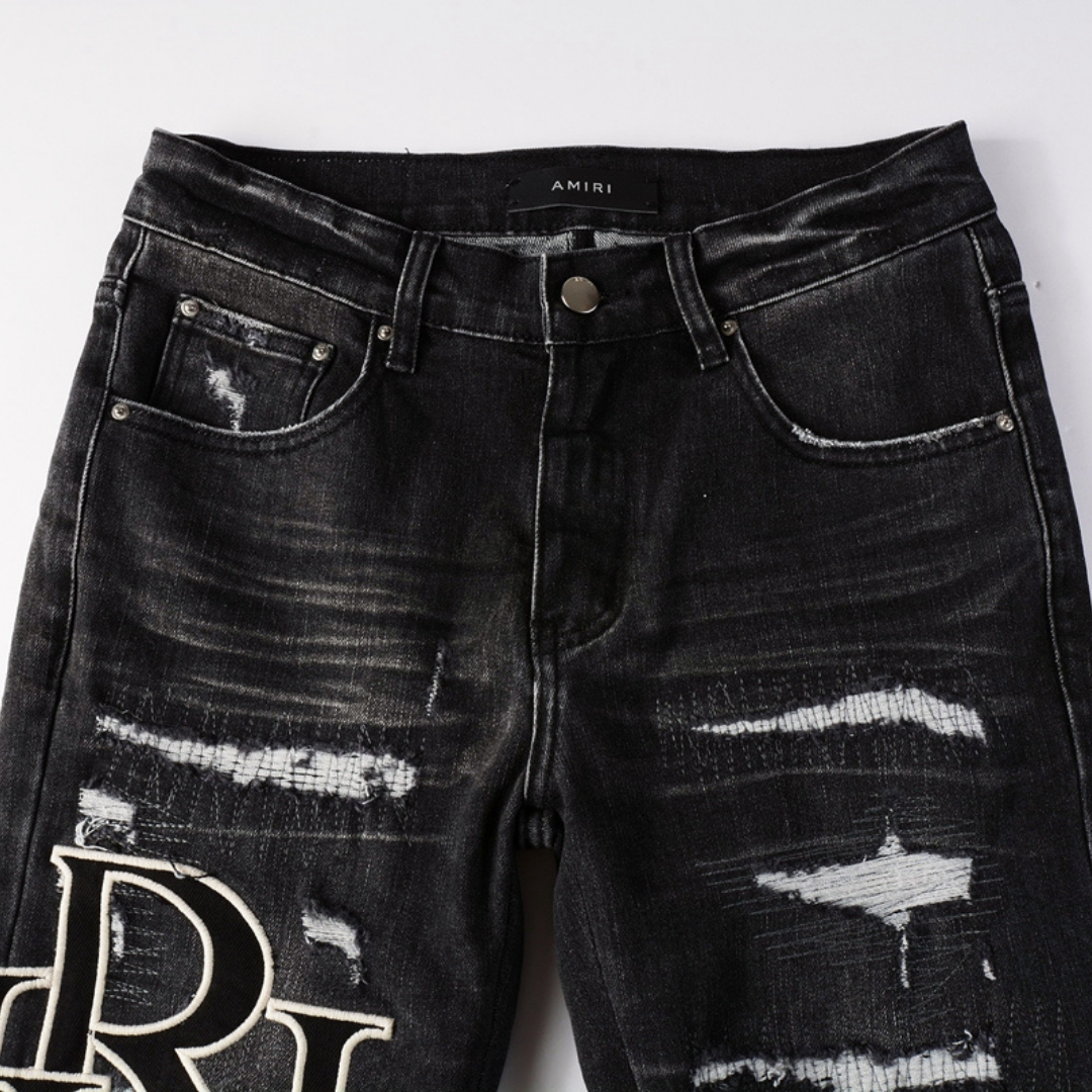 Amr Staggered Logo Patch Jeans