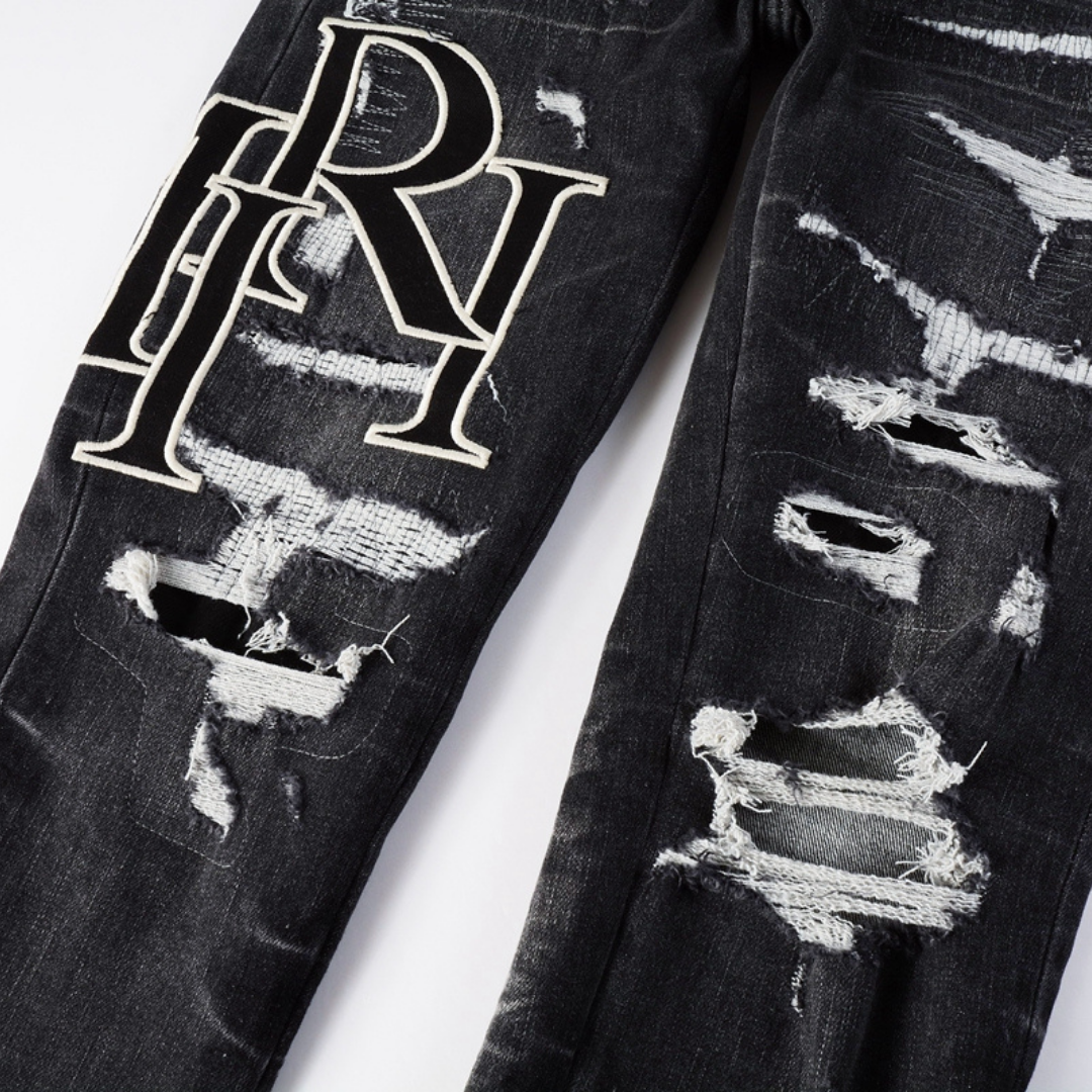 Amr Staggered Logo Patch Jeans